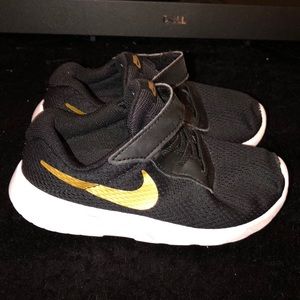 Size 10c Black and gold nikes